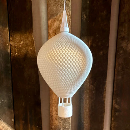 Ovarana Chandni pendant lamp unlit, showing the printed lattice pattern in daylight