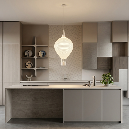Ovarana Chandni pendant lamp lit above a kitchen island