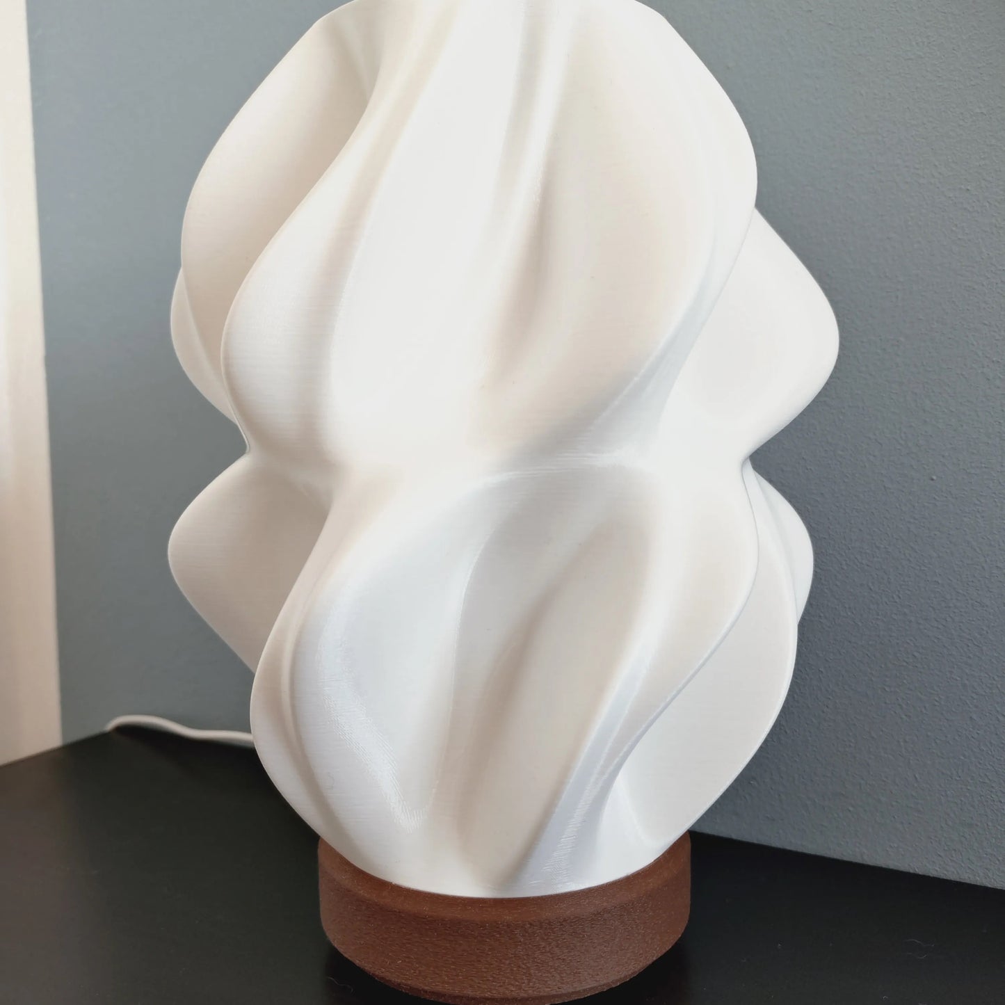 Ovarana Sanjh table lamp unlit, showing the printed layer lines across the twisted form